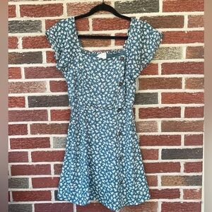 Green floral dress with elastic waist and decorative buttons down the side (S)